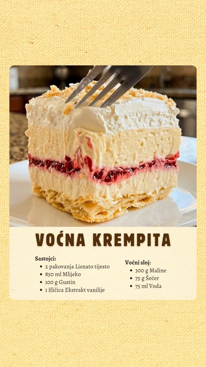 Fruchtige Cremeschnitte mit Himbeeren auf einem Teller