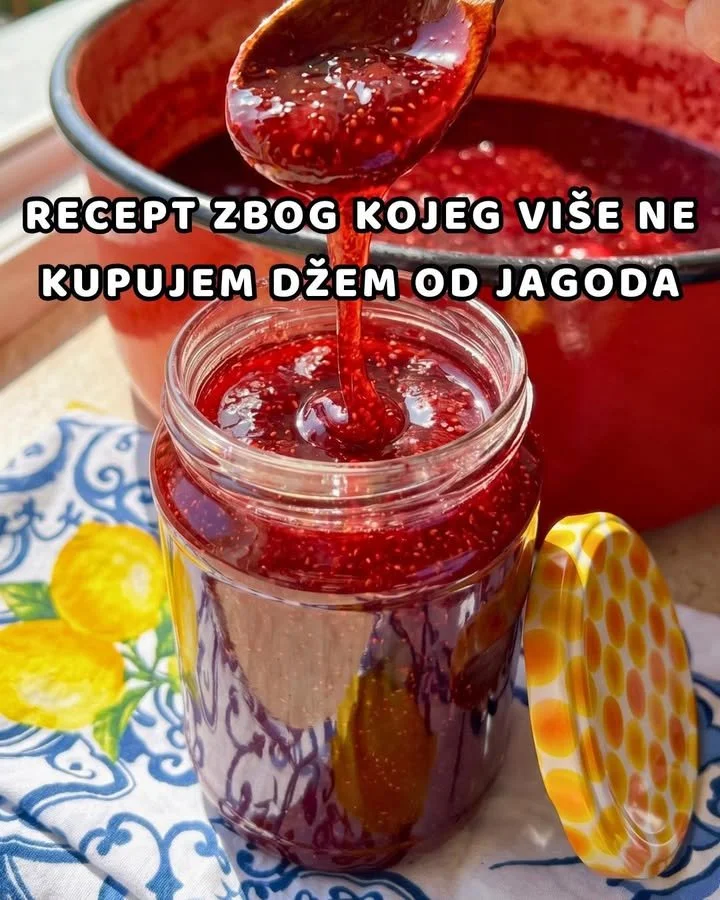 Hausgemachte Erdbeermarmelade in einem Glas und frischen Erdbeeren