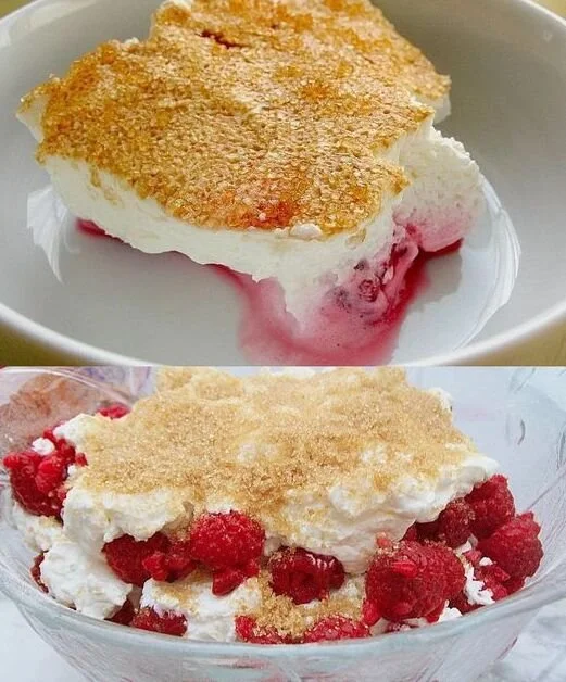 Himbeerzaubercreme in einer Schüssel, dekoriert mit frischen Himbeeren.