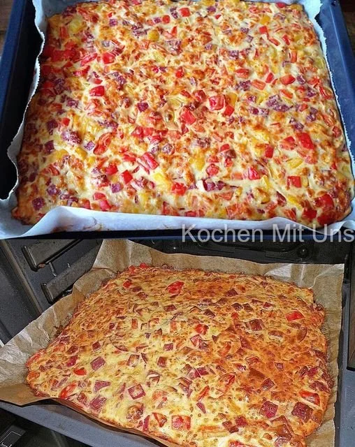 Schüttelpizza mit frischen Zutaten auf einem Holzbrett serviert.